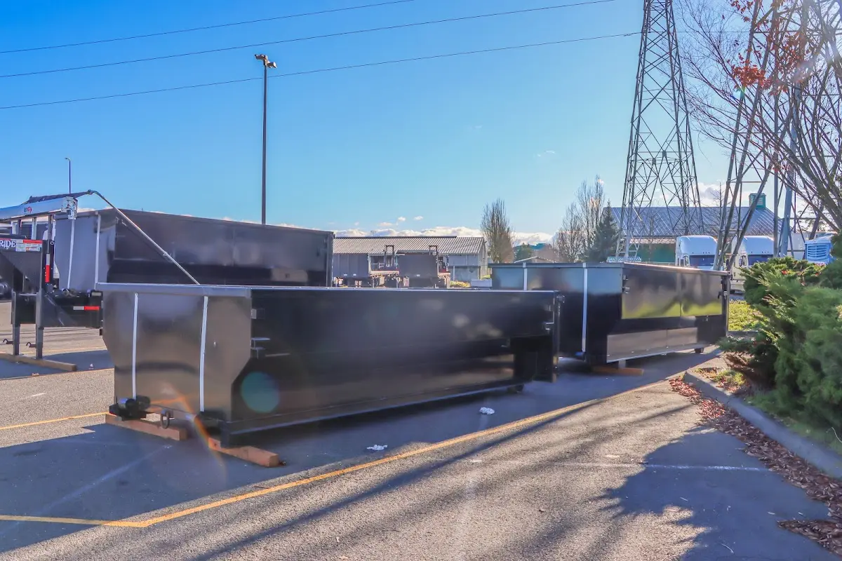 Roll-off dumpster ready for waste disposal at job site for 6 Yard Dumpster Rental in Baldwin City